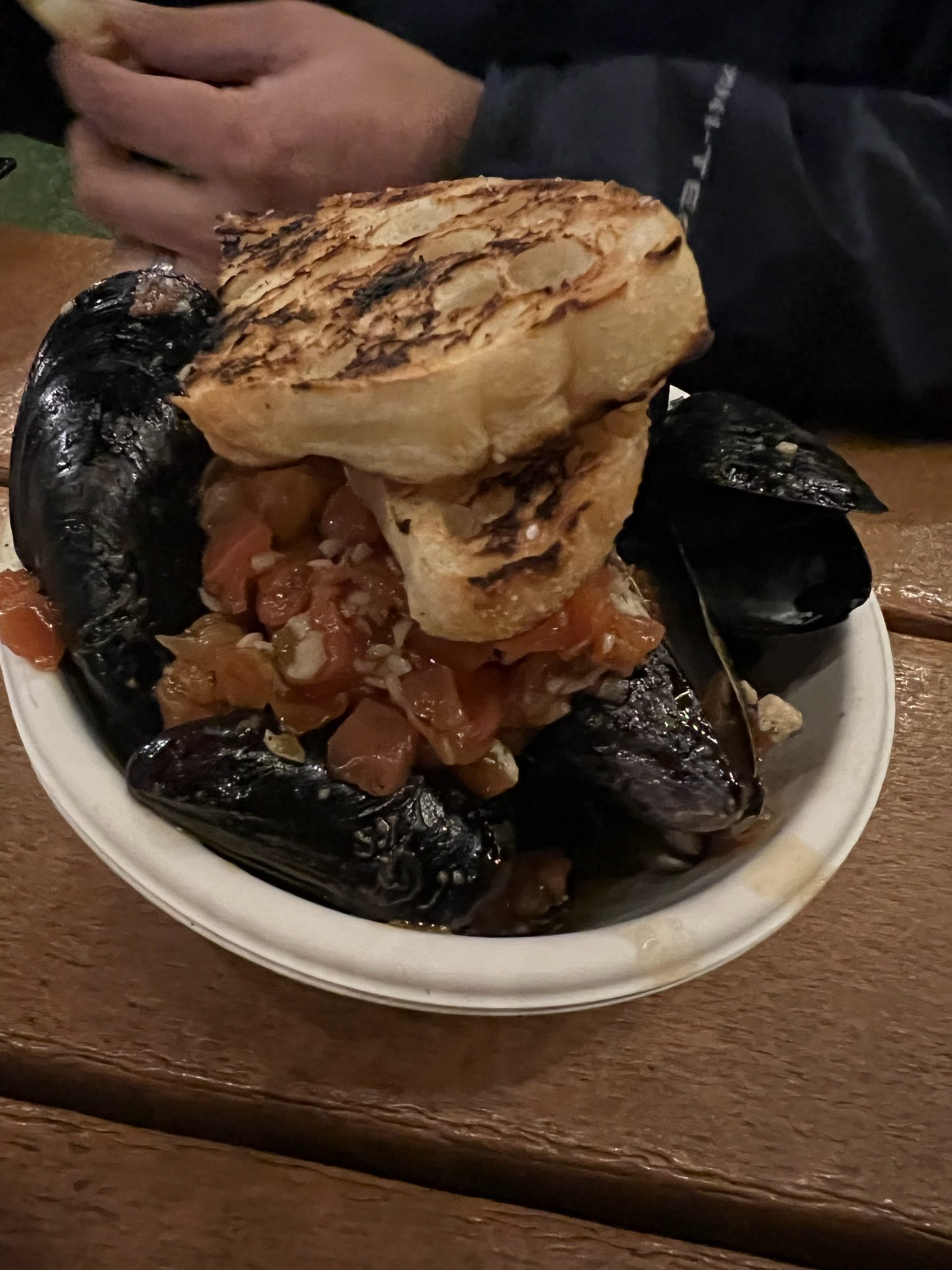 Cast Iron-roasted P.E.I. Mussels with sautéed tomatoes, garlic, and fresh herbs